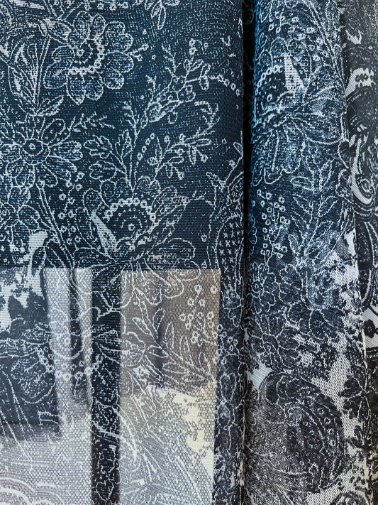 Close-up of a floral and paisley patterned fabric of a tango skirt