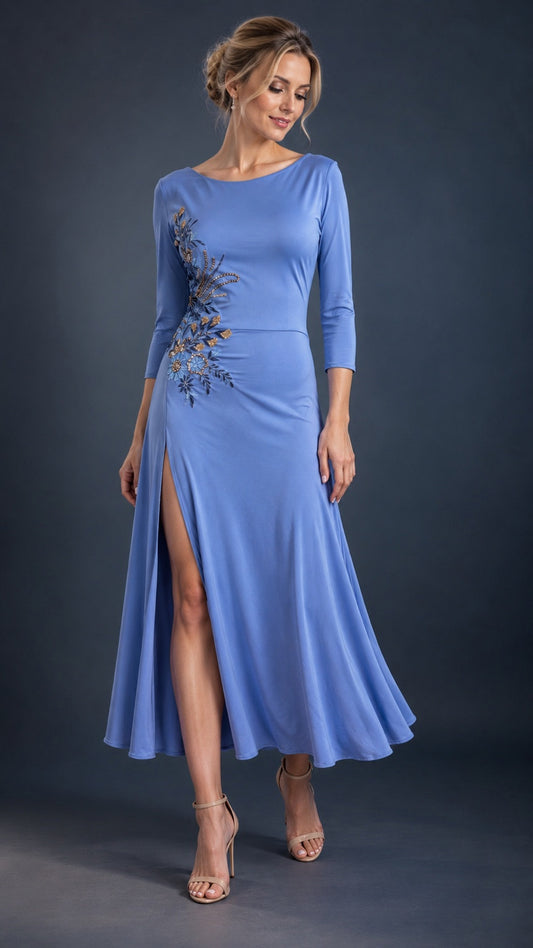 Light blue women’s tango dress with three-quarter sleeves, a high side slit, flowing midi skirt and floral embroidery, designed for Argentine tango dancing.