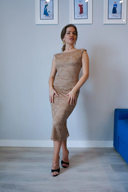 Woman wearing a gold tango dress