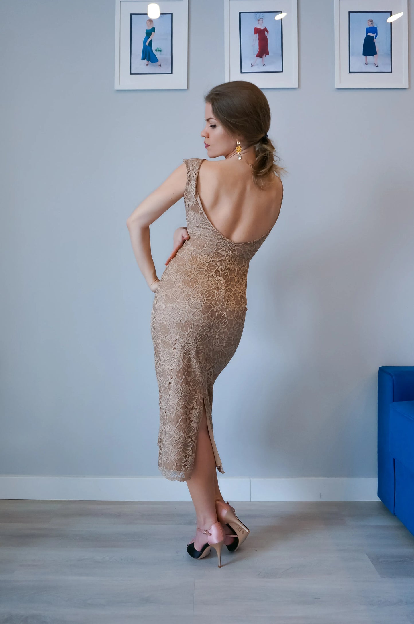 Woman in a gold tango dress