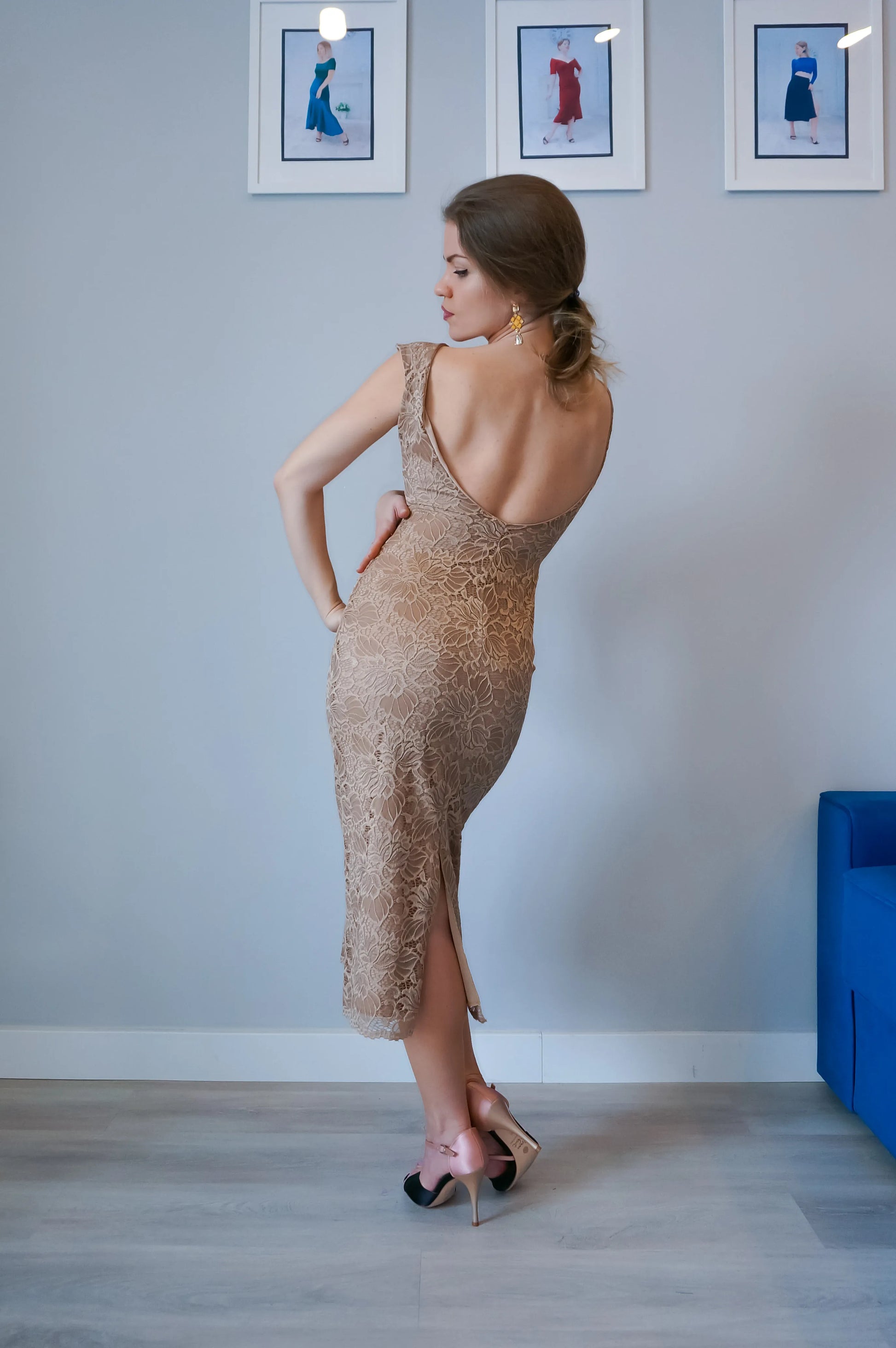 Woman in a gold tango dress