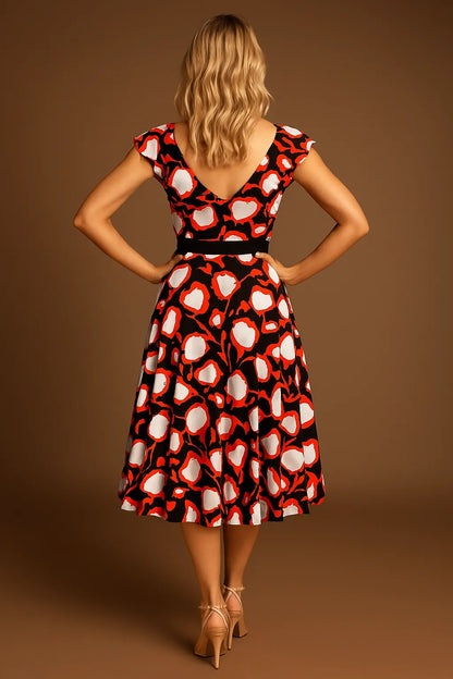 Graceful stretch jersey tango dress with flutter sleeves and back tail