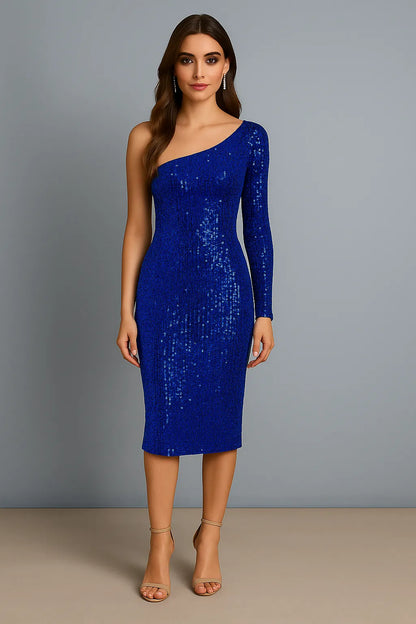 Woman wearing a blue sequin tango dress against a gray background