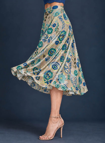 Women’s A-line tango skirt in silky jersey with a vibrant multicolor abstract print, wide waistband, and flowing midi silhouette.