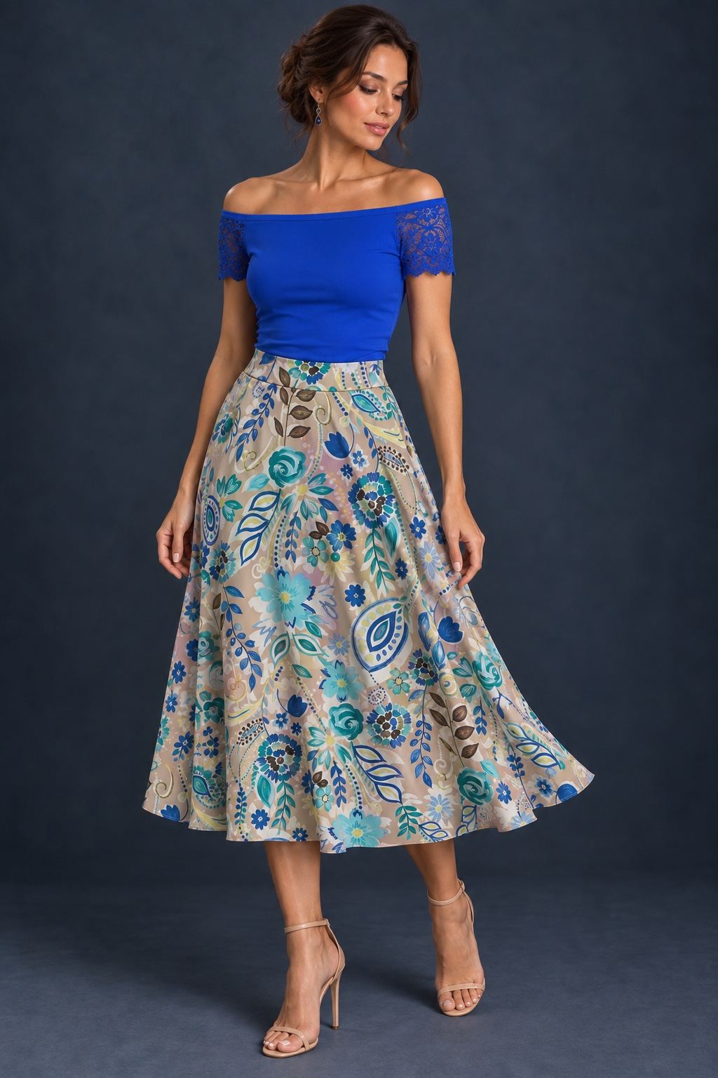 Women’s A-line tango skirt in silky jersey with a vibrant multicolor abstract print, wide waistband, and flowing midi silhouette.