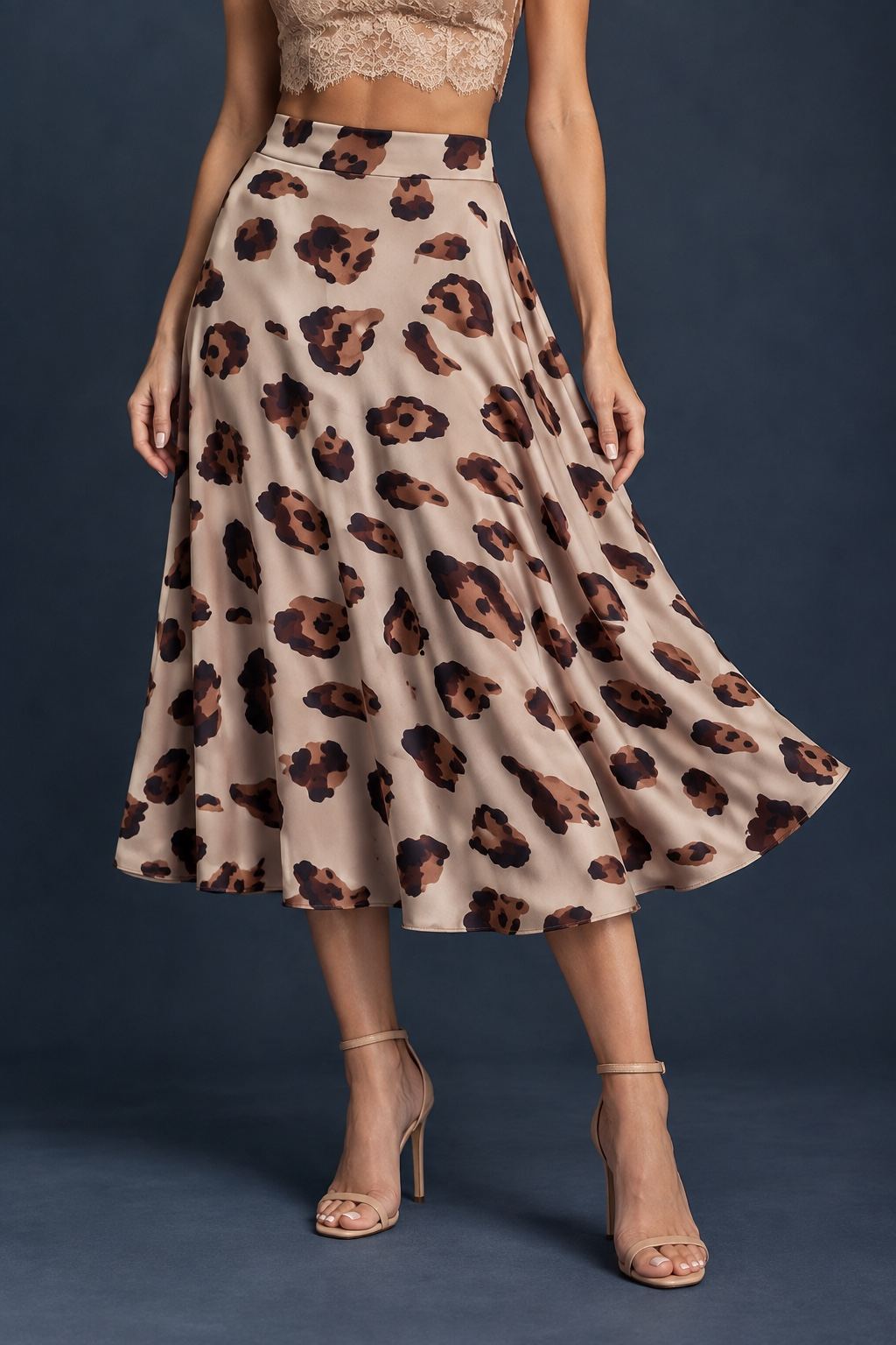 Women’s A-line tango skirt in silky jersey with a wide waistband, midi length, and leopard print.