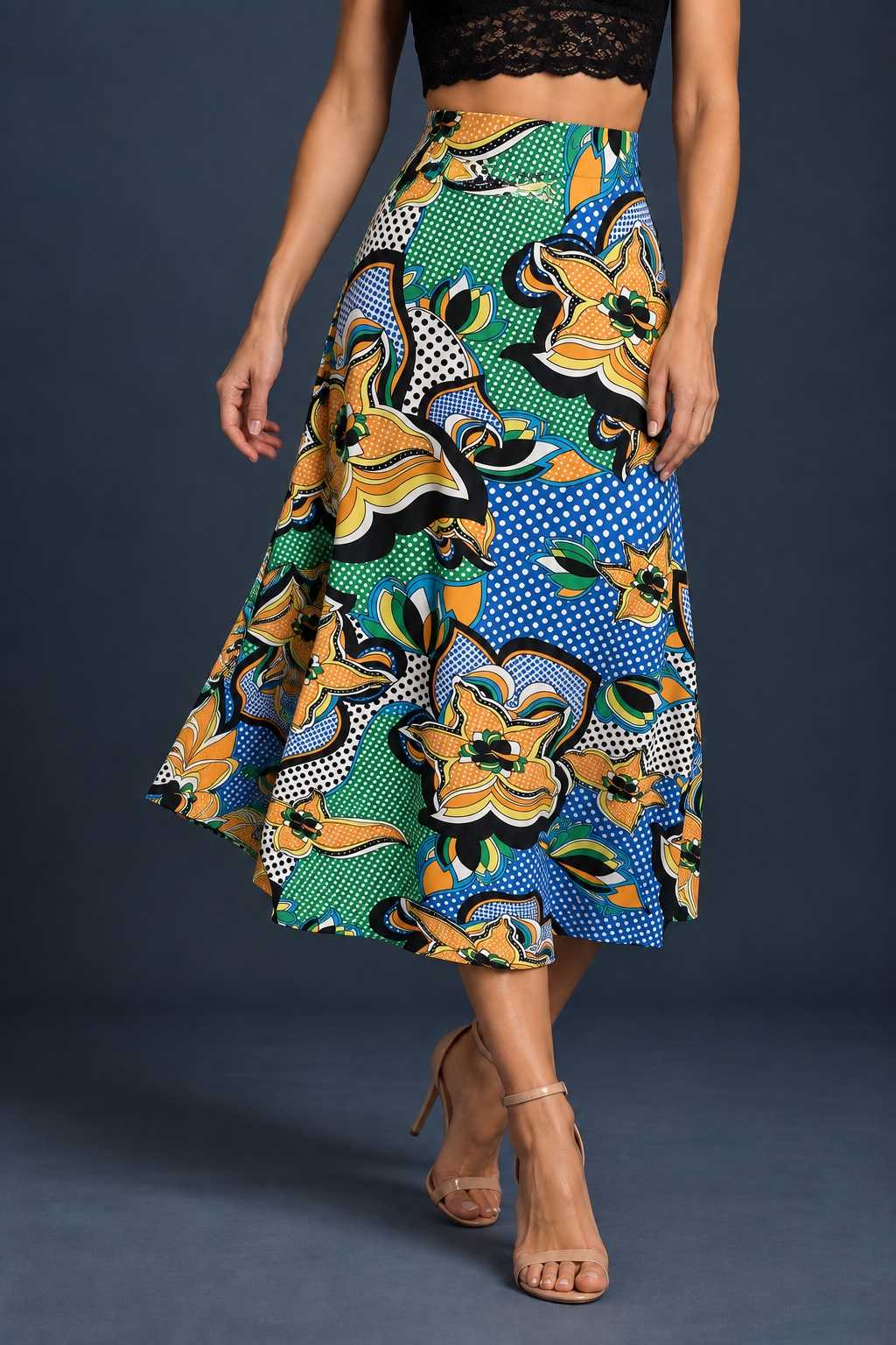 Women’s A-line tango skirt in silky jersey with a bold multicolor floral print, wide waistband, and flowing midi silhouette.