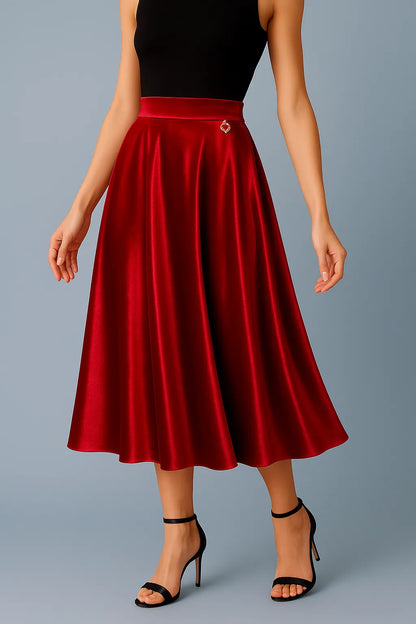 Red satin tango skirt worn by a woman on a gray background