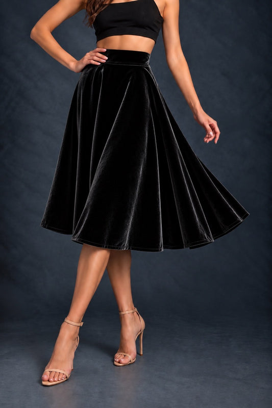 Women’s smooth velvet tango skirt with a full A-line silhouette, wide waistband and midi length, designed for fluid movement and made in France.
