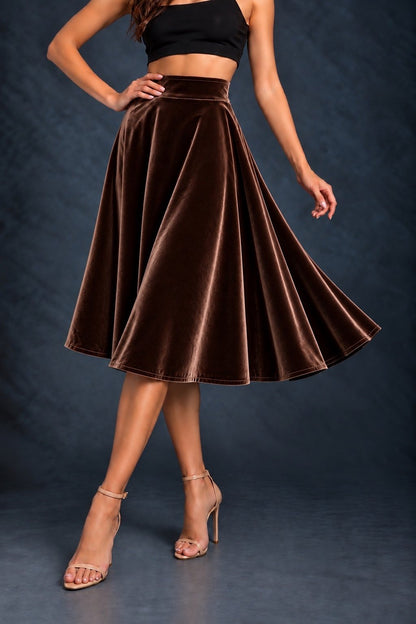 Women’s smooth velvet tango skirt with a full A-line silhouette, wide waistband and midi length, designed for fluid movement and made in France.