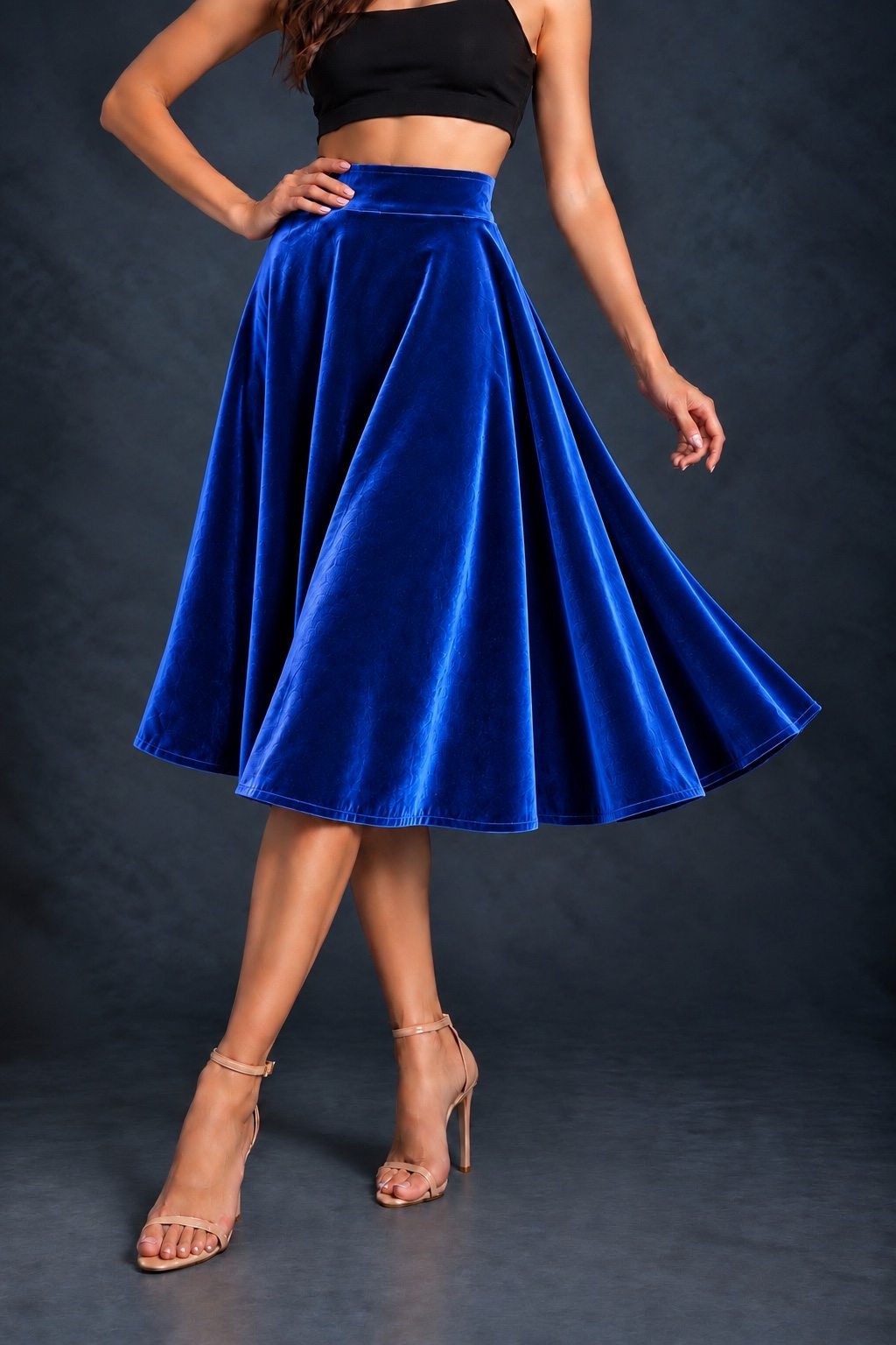 Women’s smooth velvet tango skirt with a full A-line silhouette, wide waistband and midi length, designed for fluid movement and made in France.