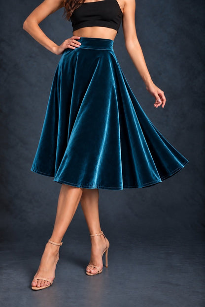 Women’s smooth velvet tango skirt with a full A-line silhouette, wide waistband and midi length, designed for fluid movement and made in France.