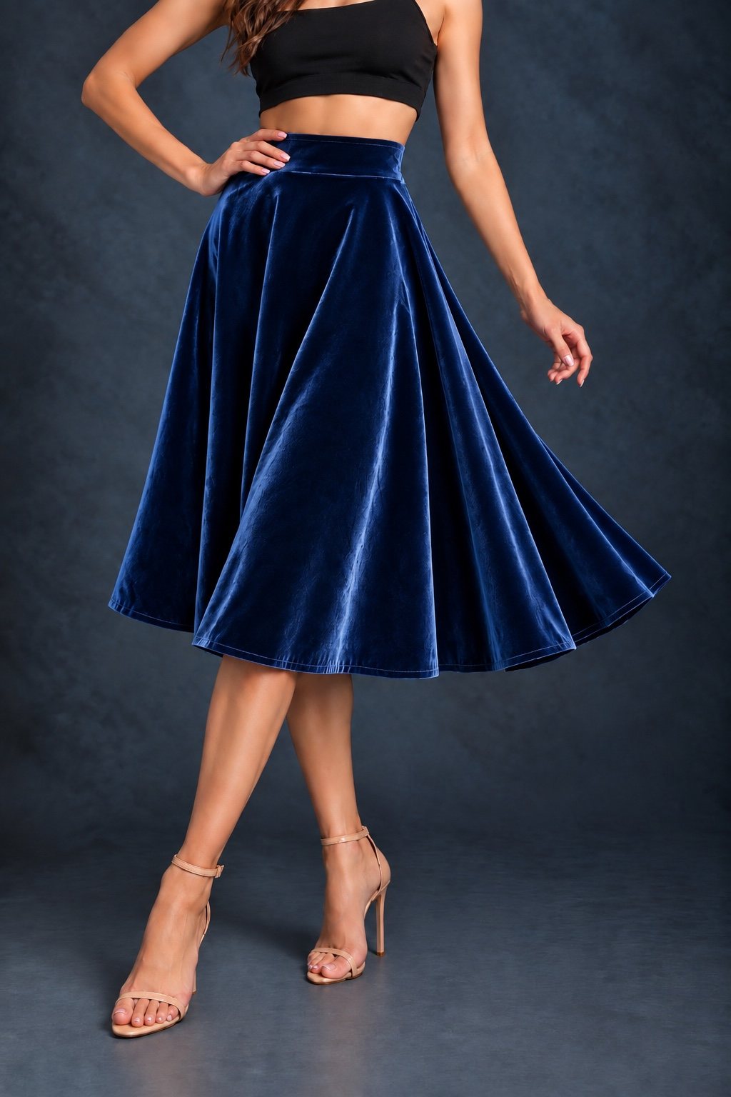 Women’s smooth velvet tango skirt with a full A-line silhouette, wide waistband and midi length, designed for fluid movement and made in France.