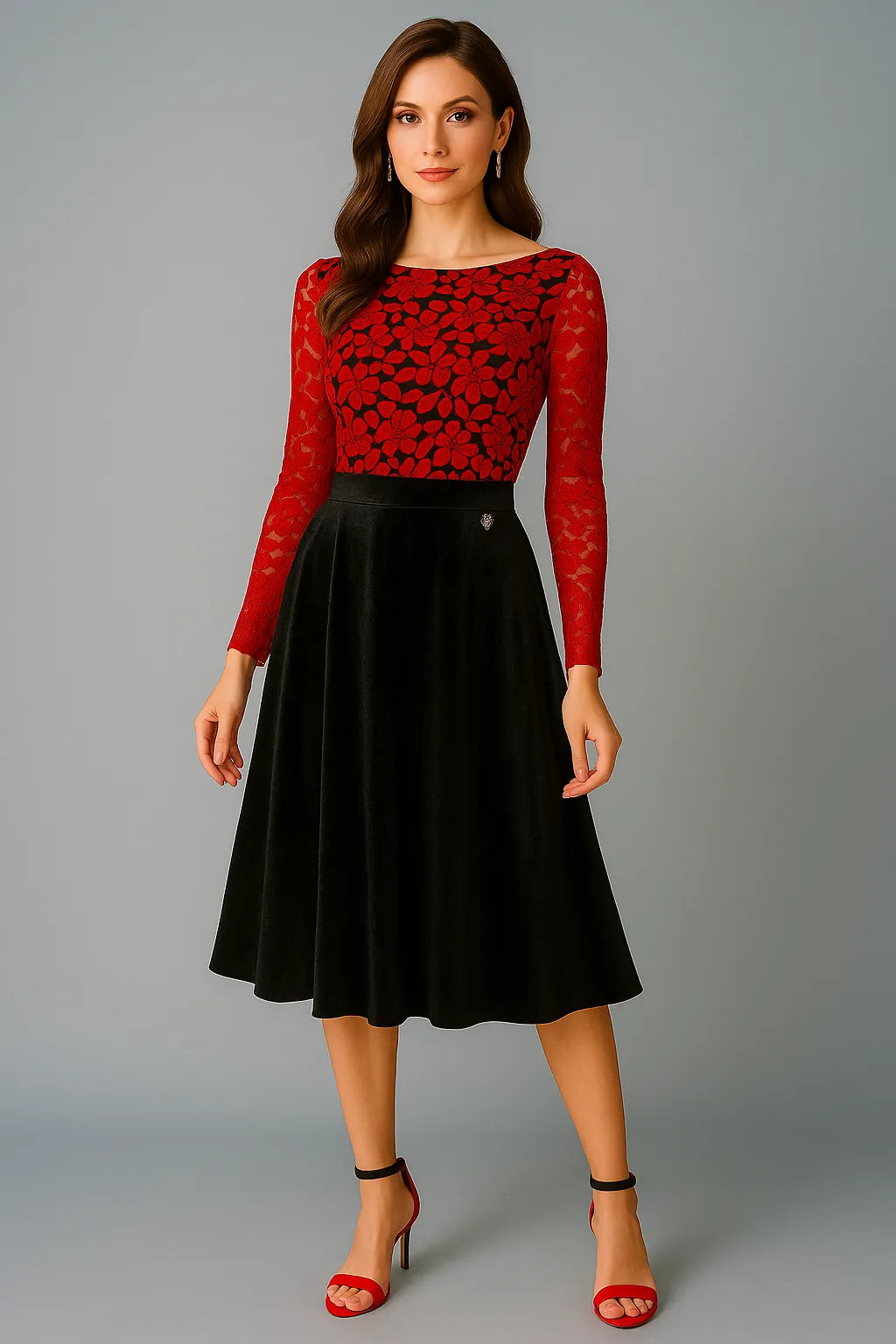 Woman wearing a red floral tango top and black tango skirt on a gray background