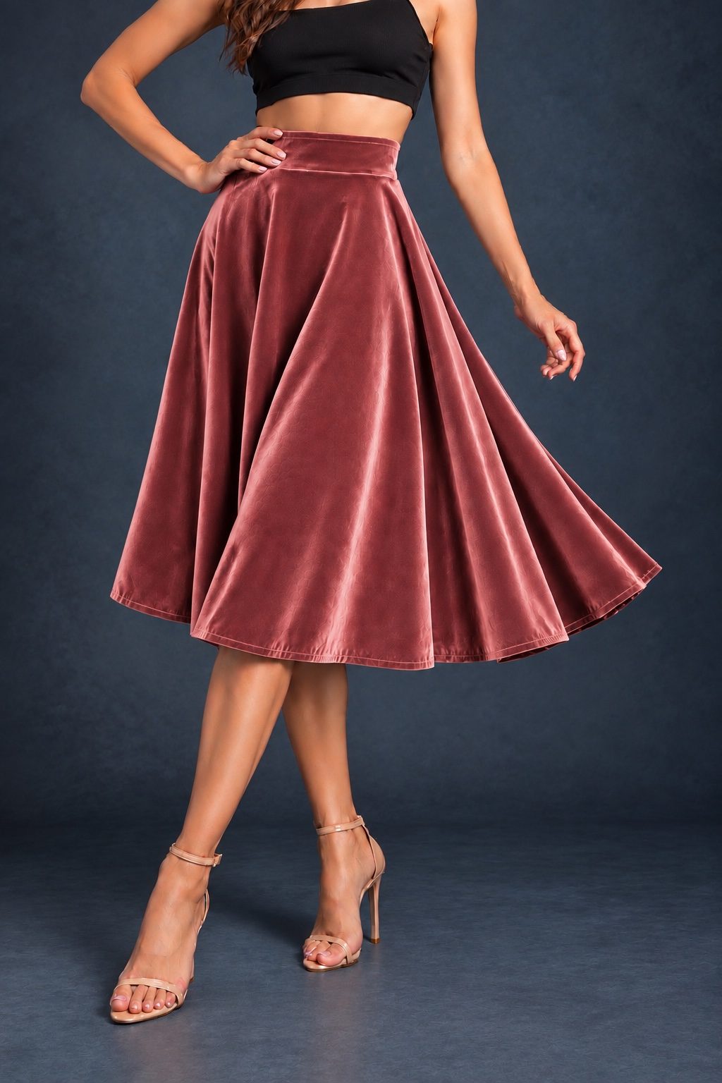 Women’s smooth velvet tango skirt with a full A-line silhouette, wide waistband and midi length, designed for fluid movement and made in France.