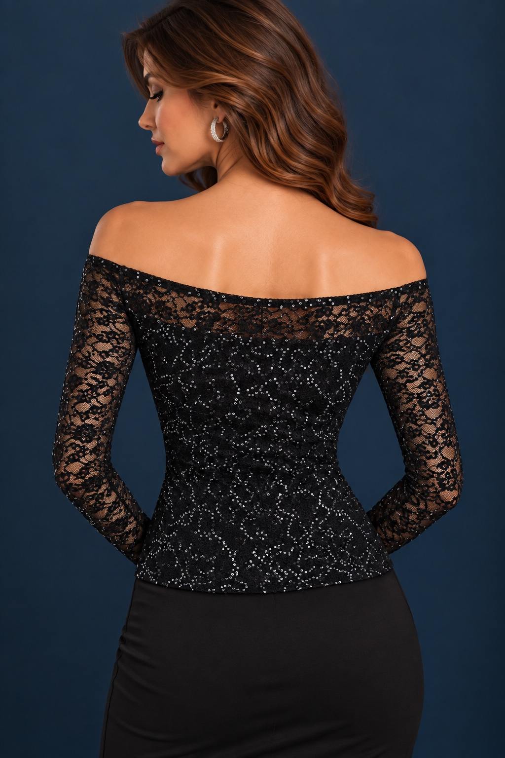 Back view of a black shimmering lace tango top with an off-shoulder neckline and sheer long sleeves.