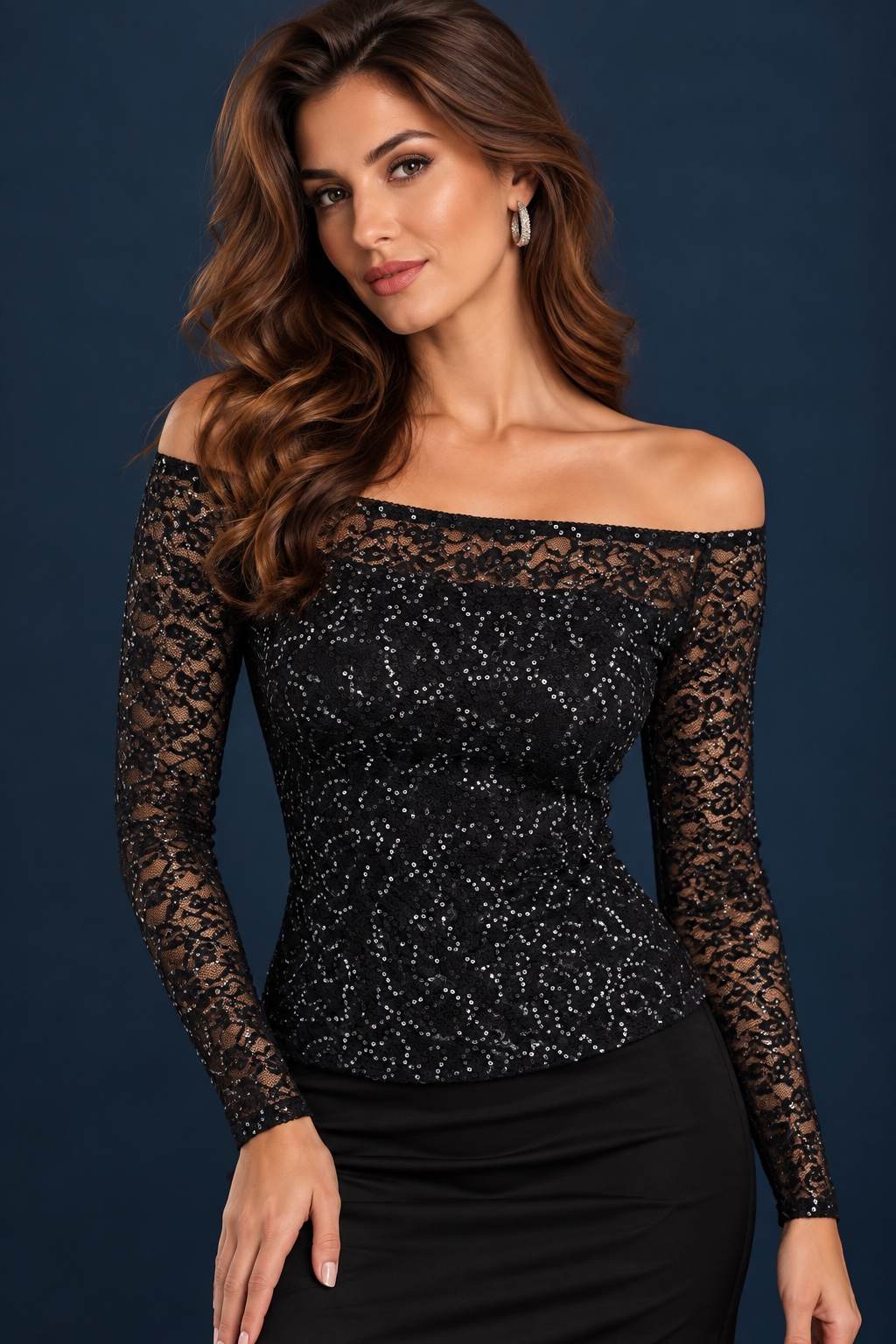 Woman wearing a black shimmering lace tango top with an off-shoulder neckline and sheer long lace sleeves, front view.