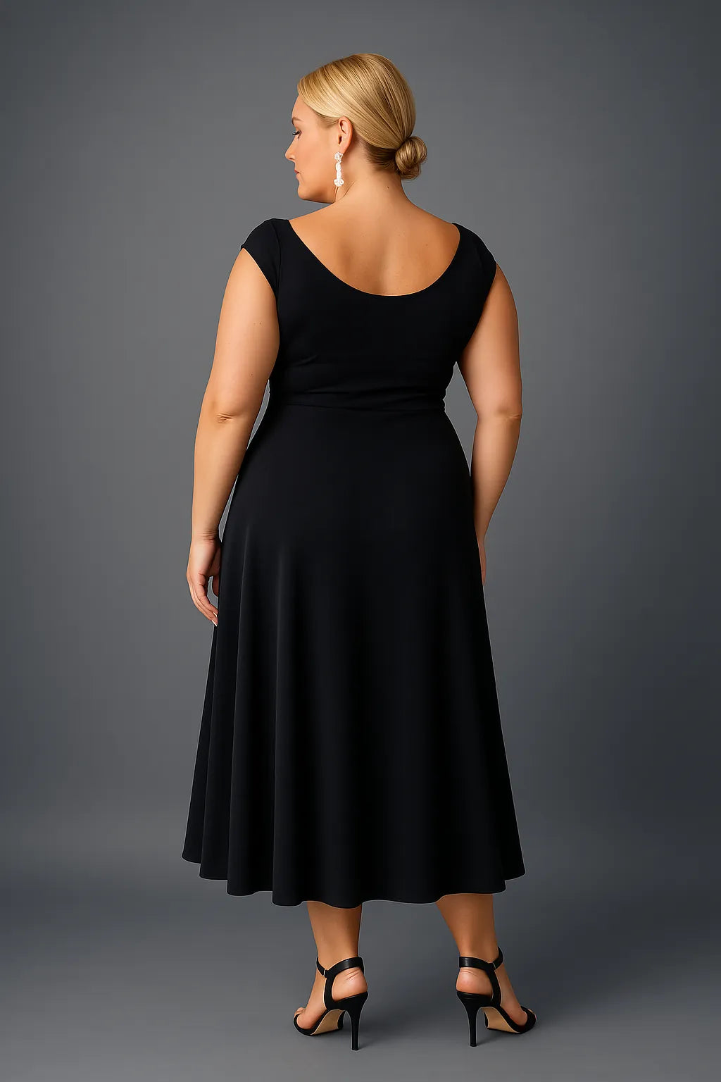 Black silky jersey tango dress with wide flowing skirt