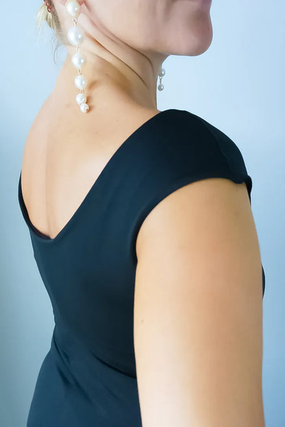 Black silky jersey tango dress with wide flowing skirt