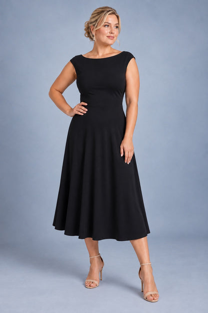 Black silky jersey tango dress in size XL with wide shoulders and a flowing midi skirt, front view.