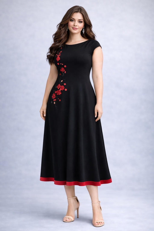 Frau trägt ein elegantes schwarz-rotes Tangokleid mit Sakura-Stickerei, Vorderansicht