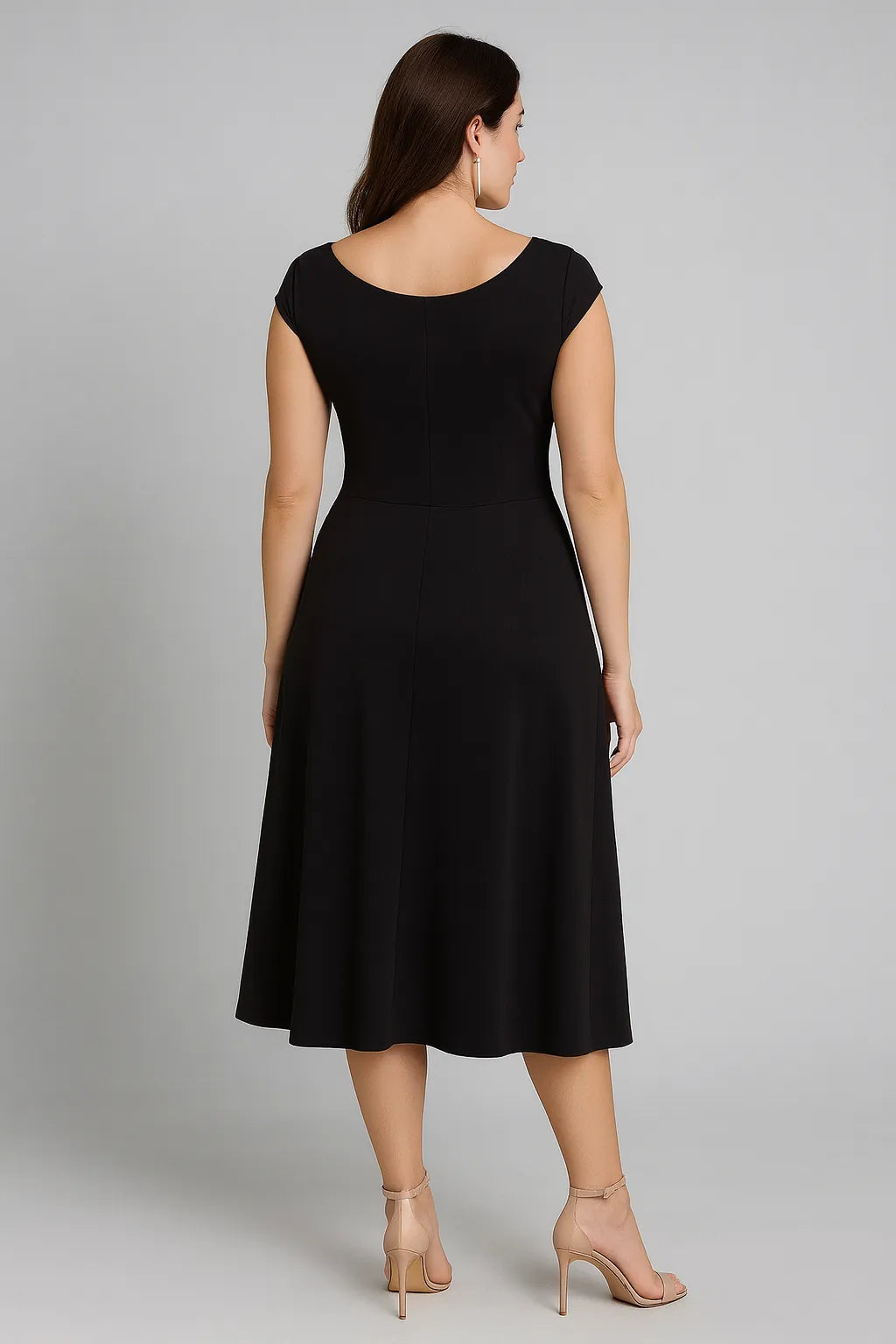 Chic jersey dress with semi-open back and refined draping