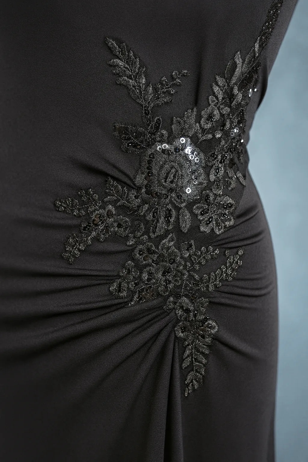 Chic jersey dress with semi-open back and refined draping