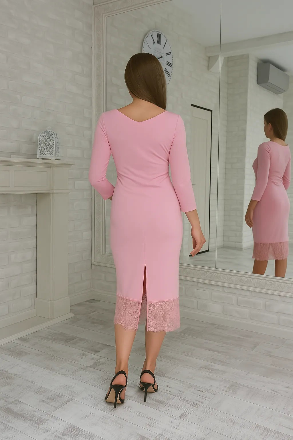 Graceful pink jersey dress with lace detail and flowing silhouette