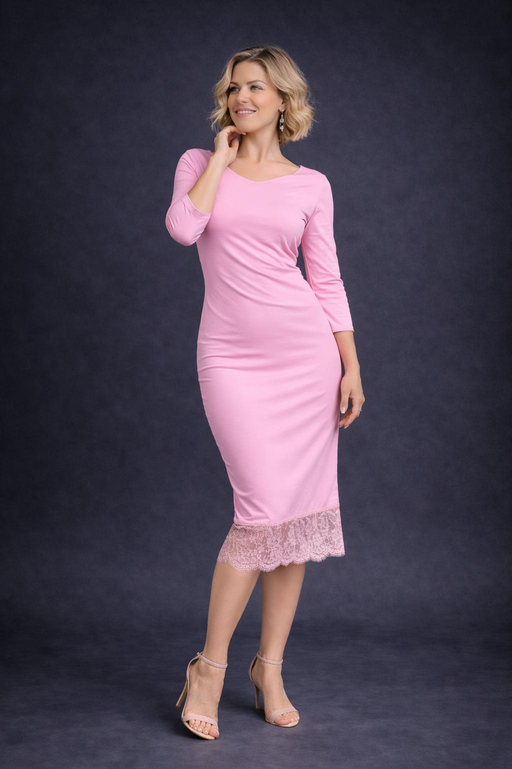 Woman wearing a cold rose tango dress with lace hem, front view
