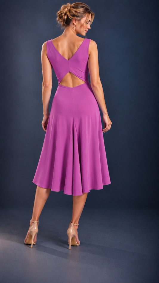 Back view of a magenta women’s tango dress with a flowing skirt and elegant open-back cutout designed to cover a bra strap.