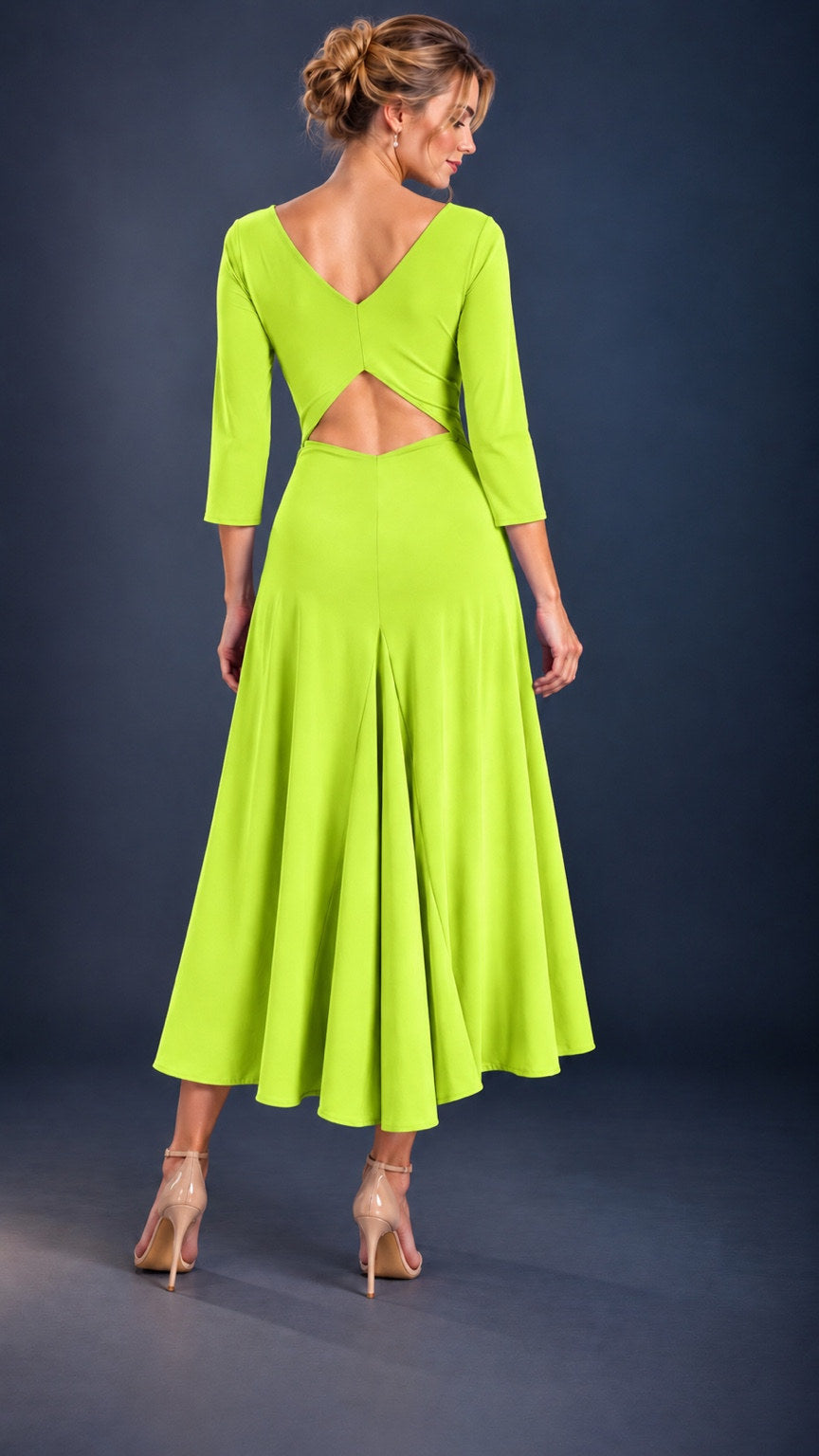 Back view of a vibrant lime green women’s tango dress with three-quarter sleeves, a flowing skirt and elegant open-back cutout.