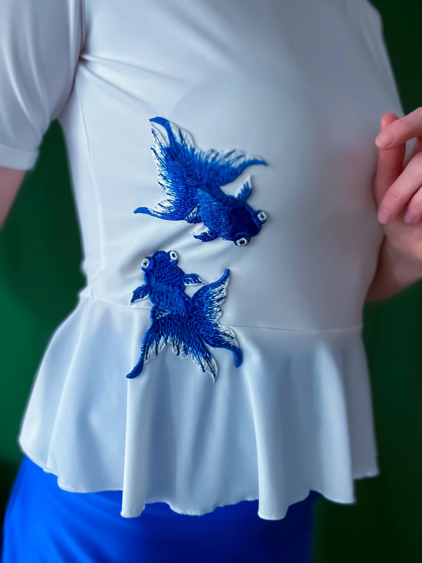 Exclusive peplum tango top in silky stretch jersey