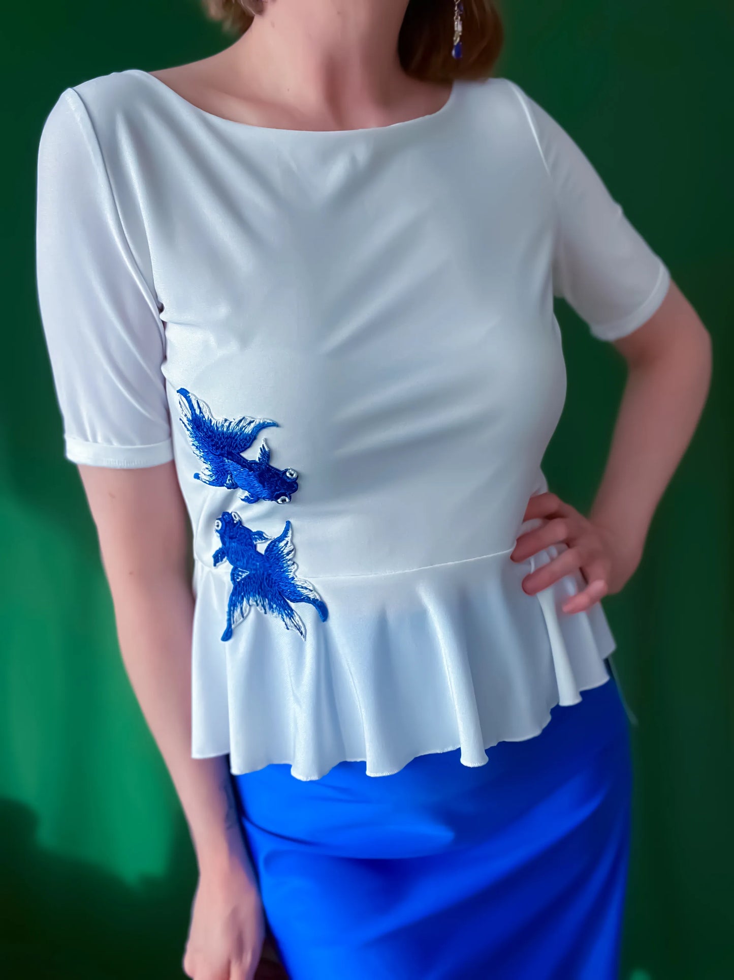 Exclusive peplum tango top in silky stretch jersey