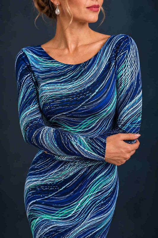 Front view of a women’s tango dress in silky textured stretch jersey with long sleeves, a fitted silhouette and asymmetric midi-length hem, designed for Argentine tango dancing.