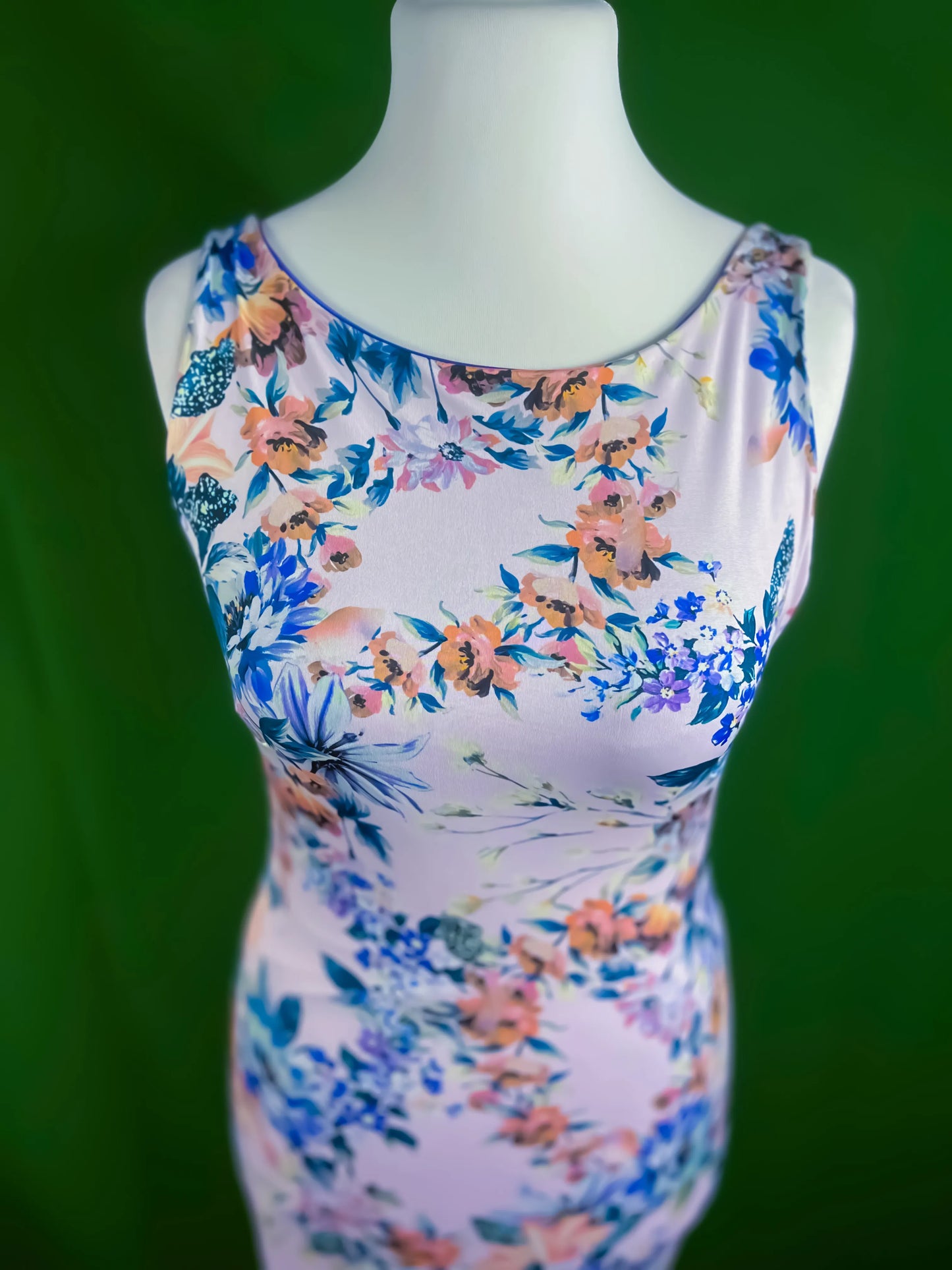 Feminine fitted tango dress with asymmetrical fishtail hem