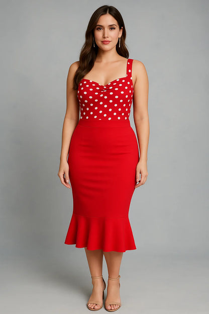 Woman wearing a red tango top and red tango skirt on a gray background