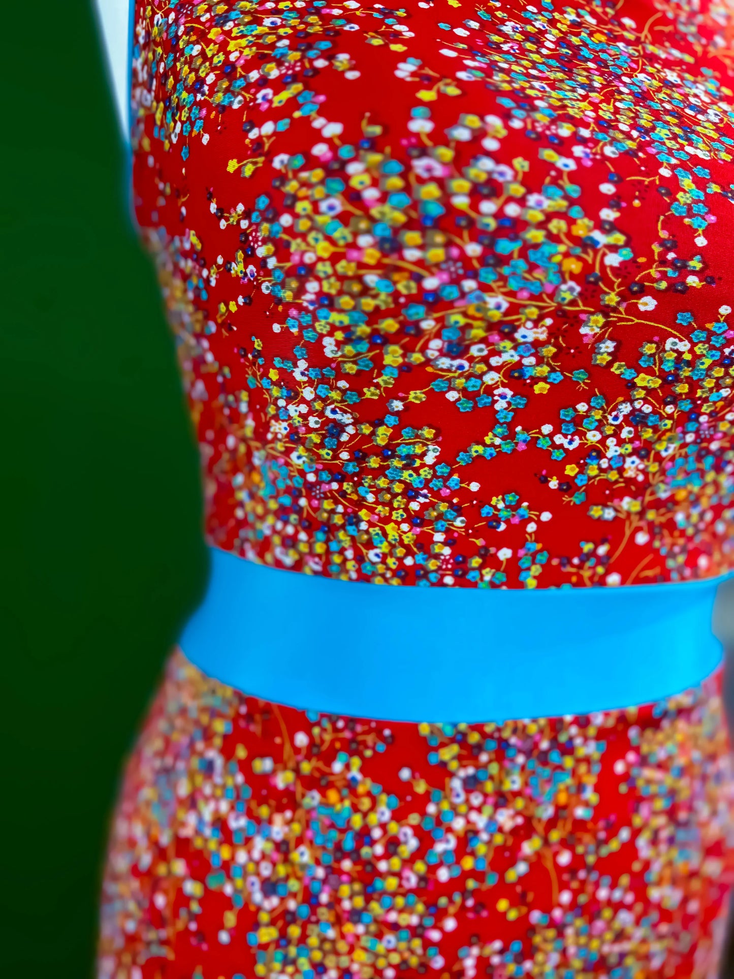 Turquoise-accented tango dress with flowing A-line silhouette