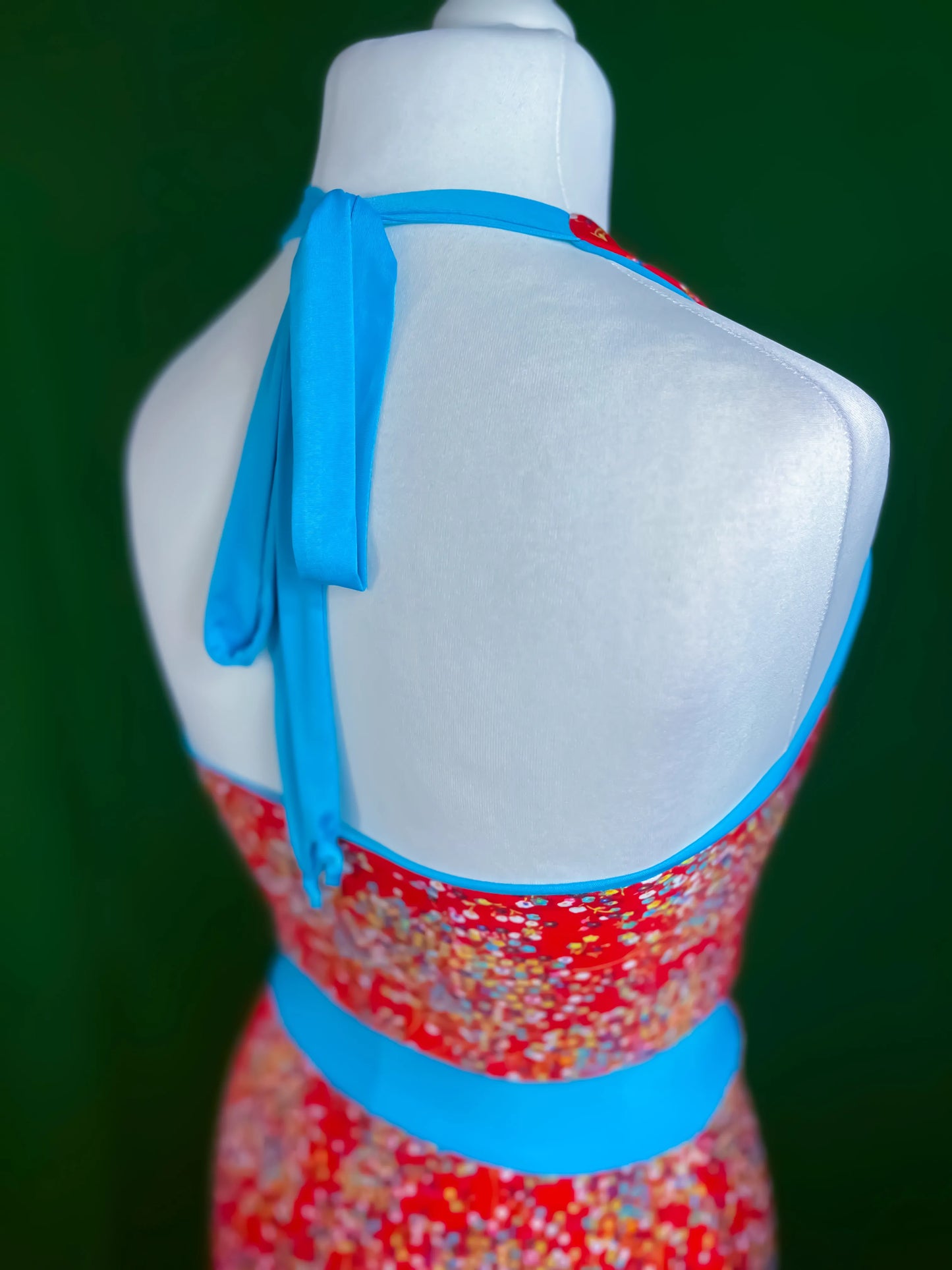 Turquoise-accented tango dress with flowing A-line silhouette