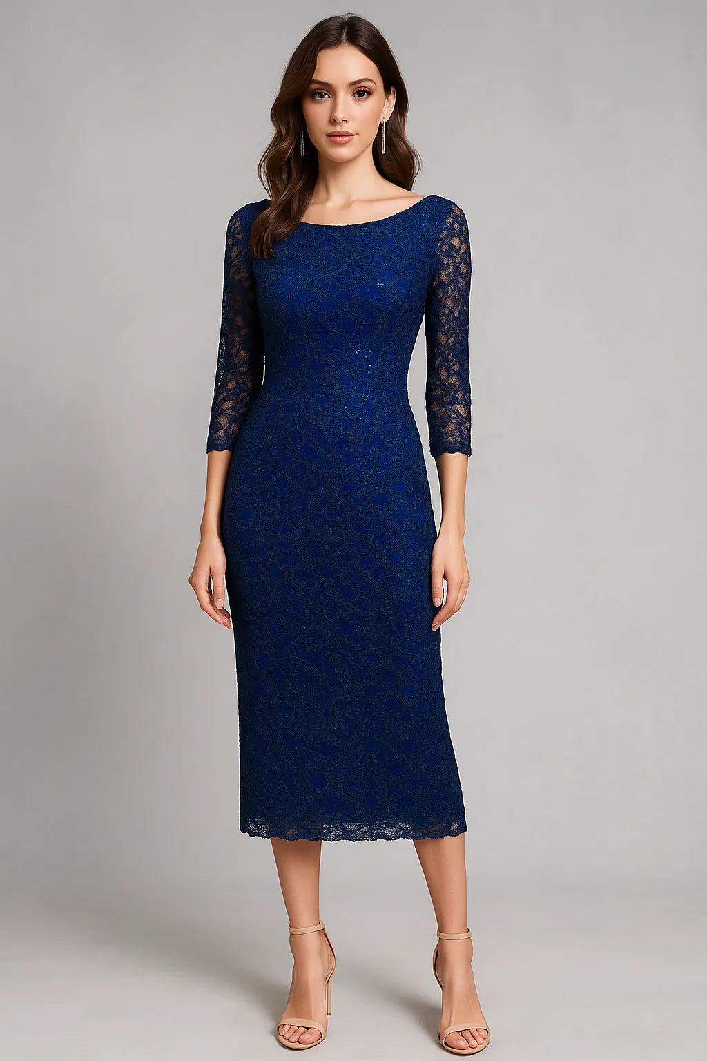 Woman wearing a blue lace tango dress with long sleeves on a gray background