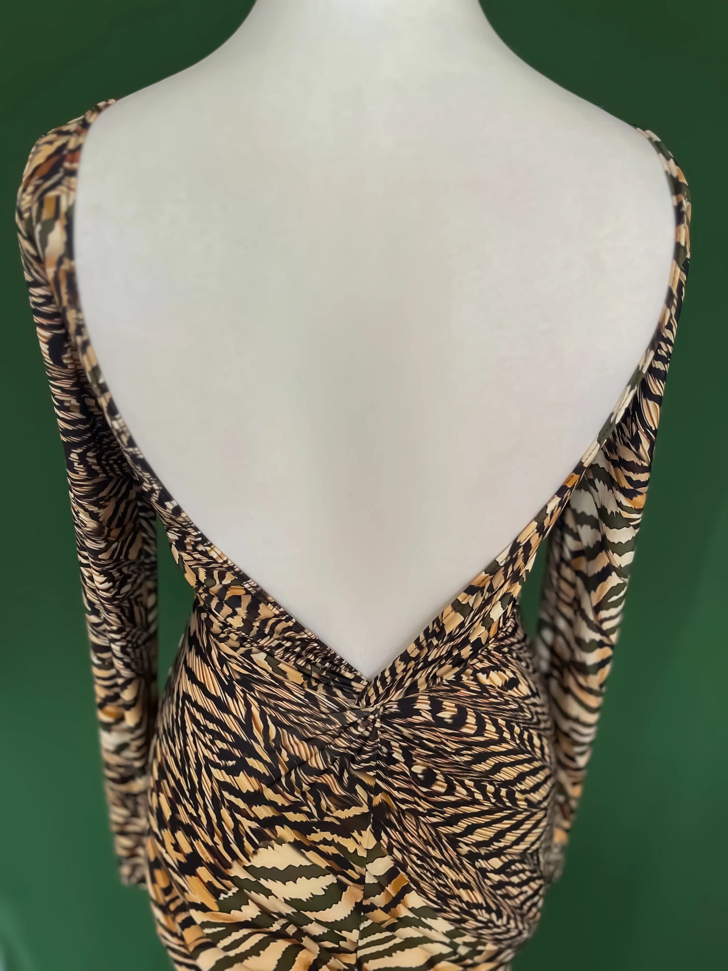 Knit tango dress with deep V-back and knot detail