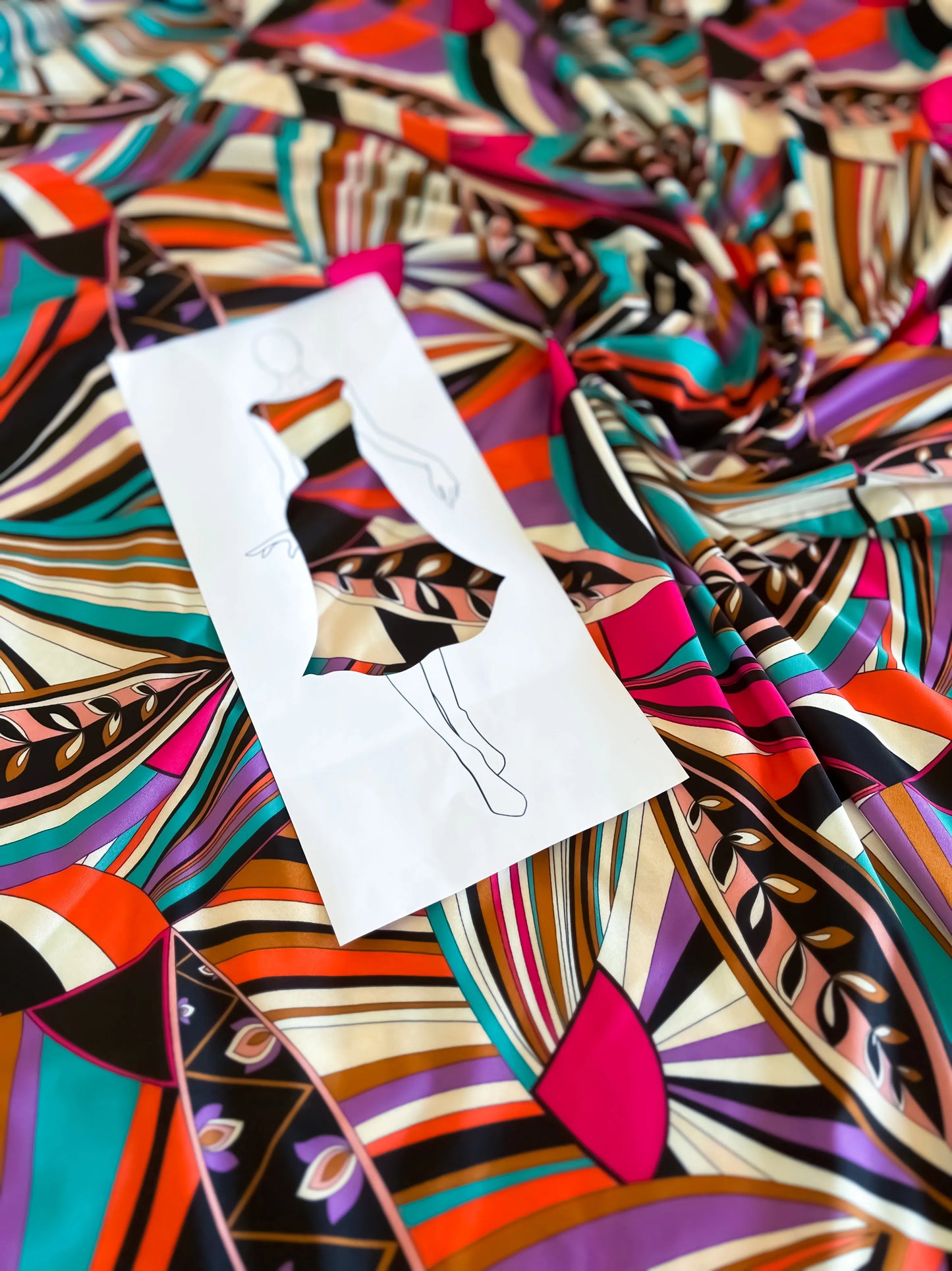 Vibrant printed jersey top with semi-open back