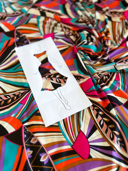 Vibrant printed jersey top with semi-open back