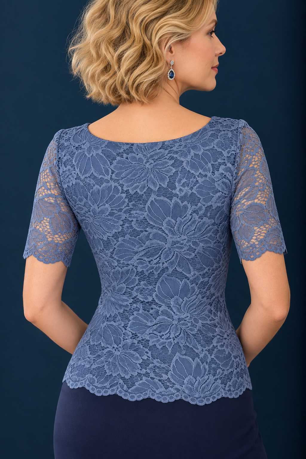 Back view of a women’s floral lace tango top with jersey lining, sheer short sleeves and a fitted silhouette.