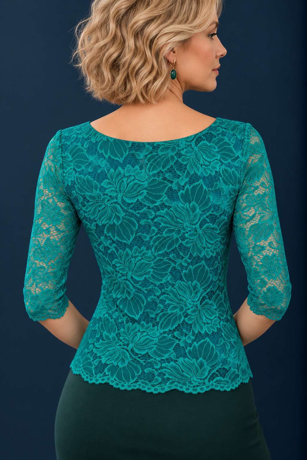Back view of a women’s floral lace tango top with jersey lining, sheer three-quarter sleeves and a fitted silhouette.