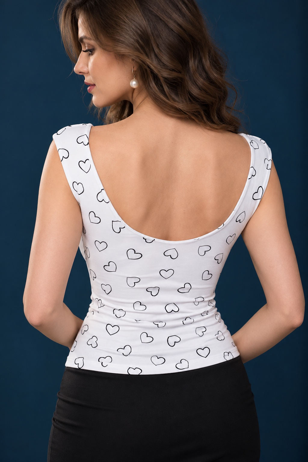 Back view of a women’s viscose jersey tango top with heart print, covered shoulders and deep rounded back.