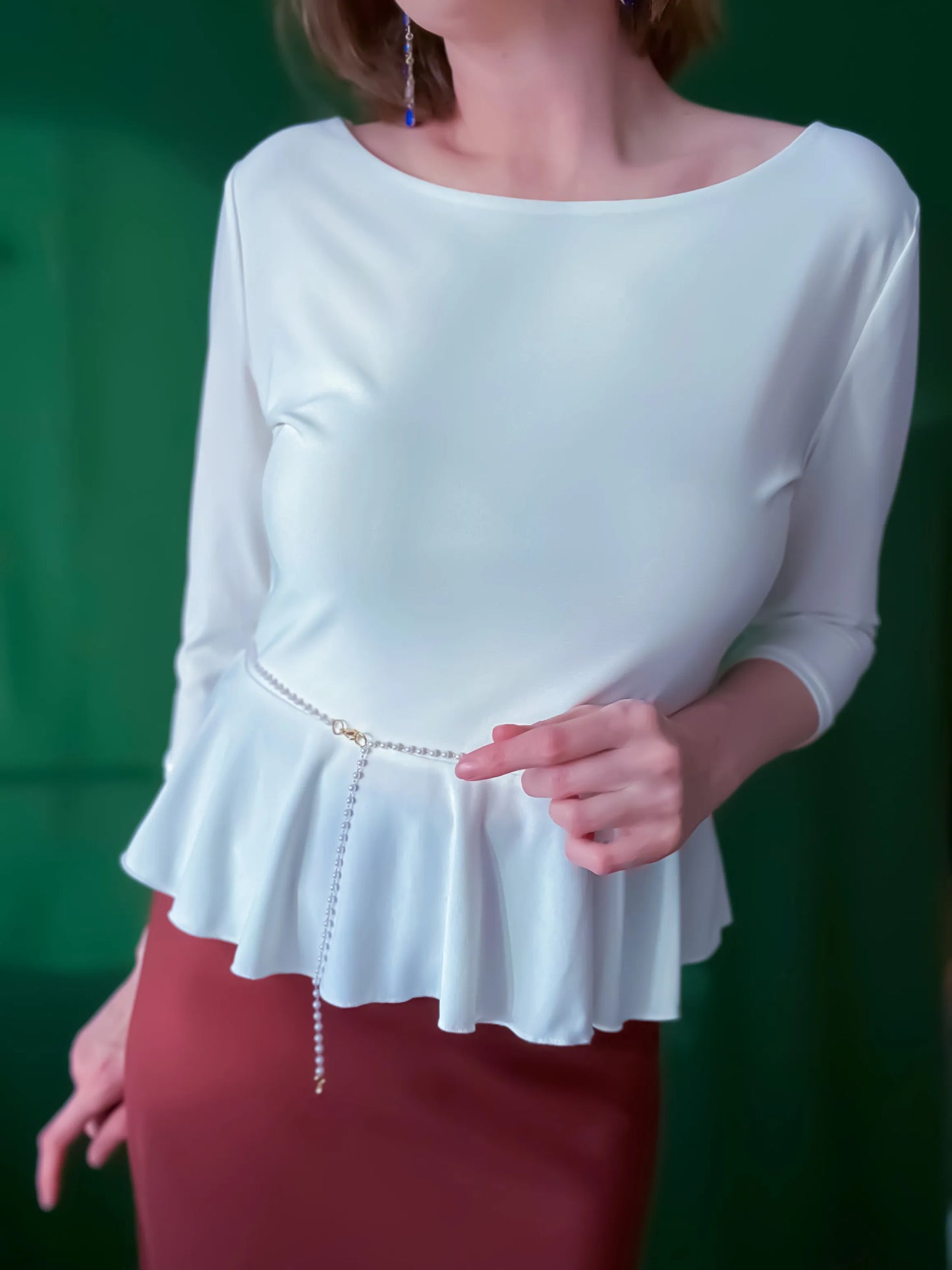 White peplum tango top with pearl belt