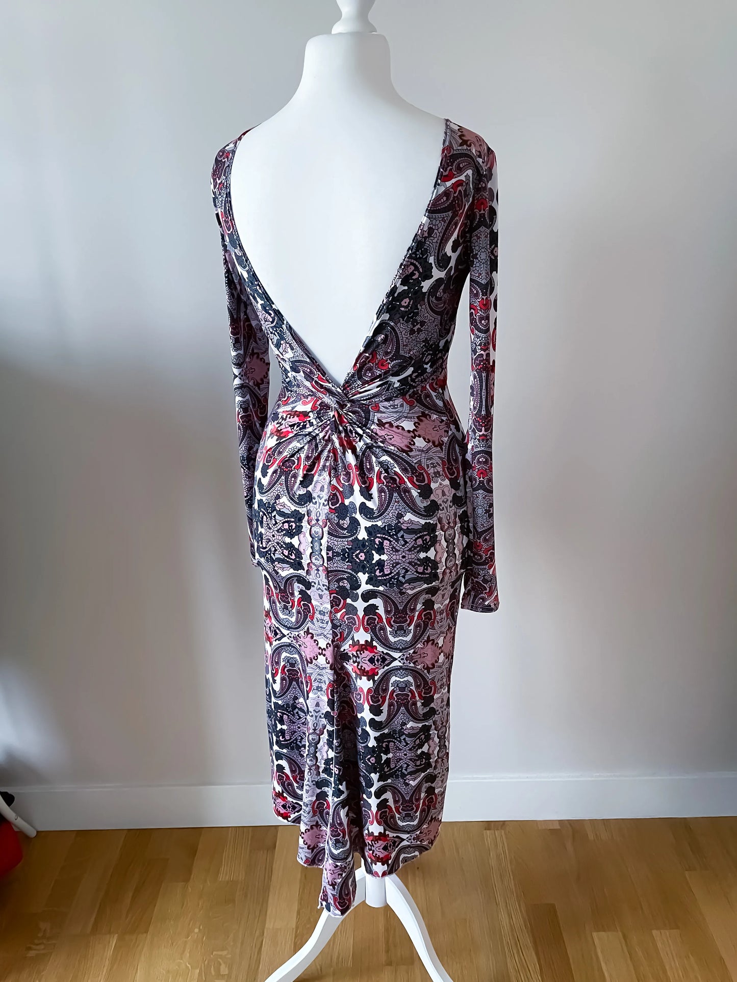 Elegant knit tango dress with deep v-back and knot detail