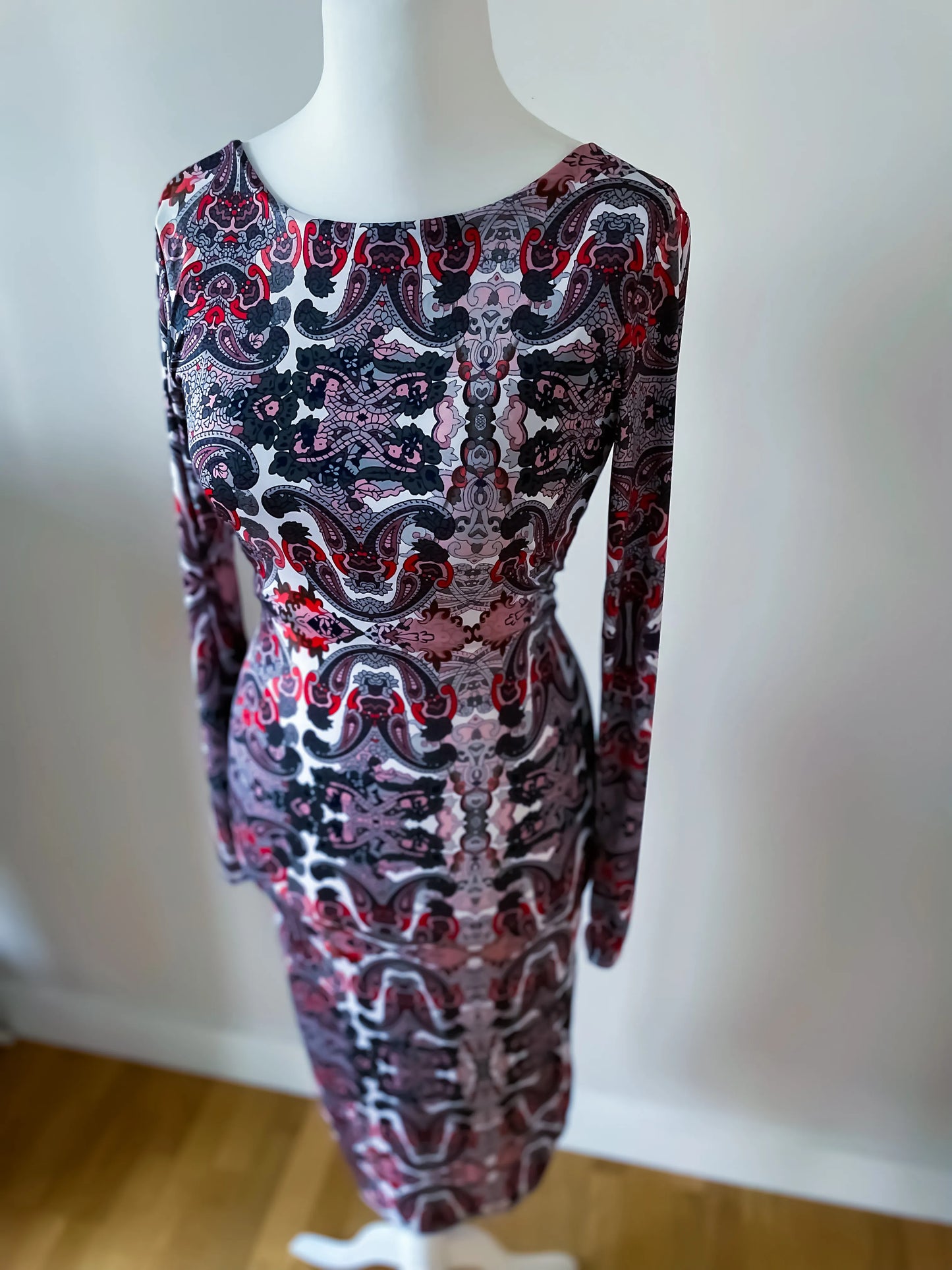 Elegant knit tango dress with deep v-back and knot detail