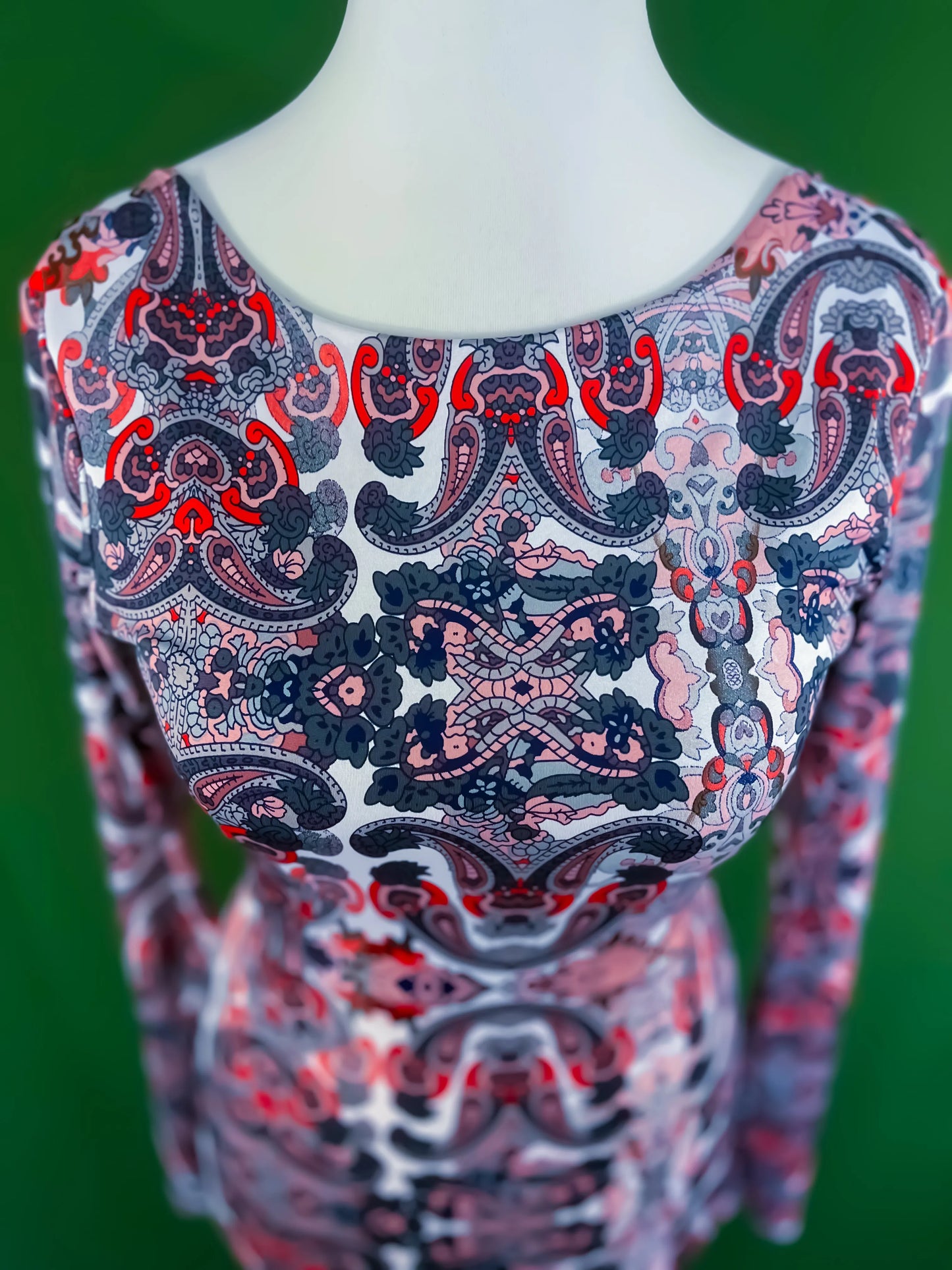 Elegant knit tango dress with deep v-back and knot detail