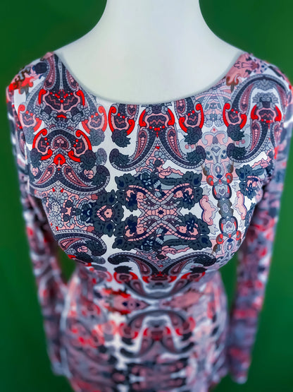 Elegant knit tango dress with deep v-back and knot detail